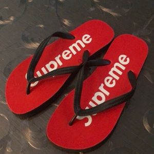 supreme flip flops red
